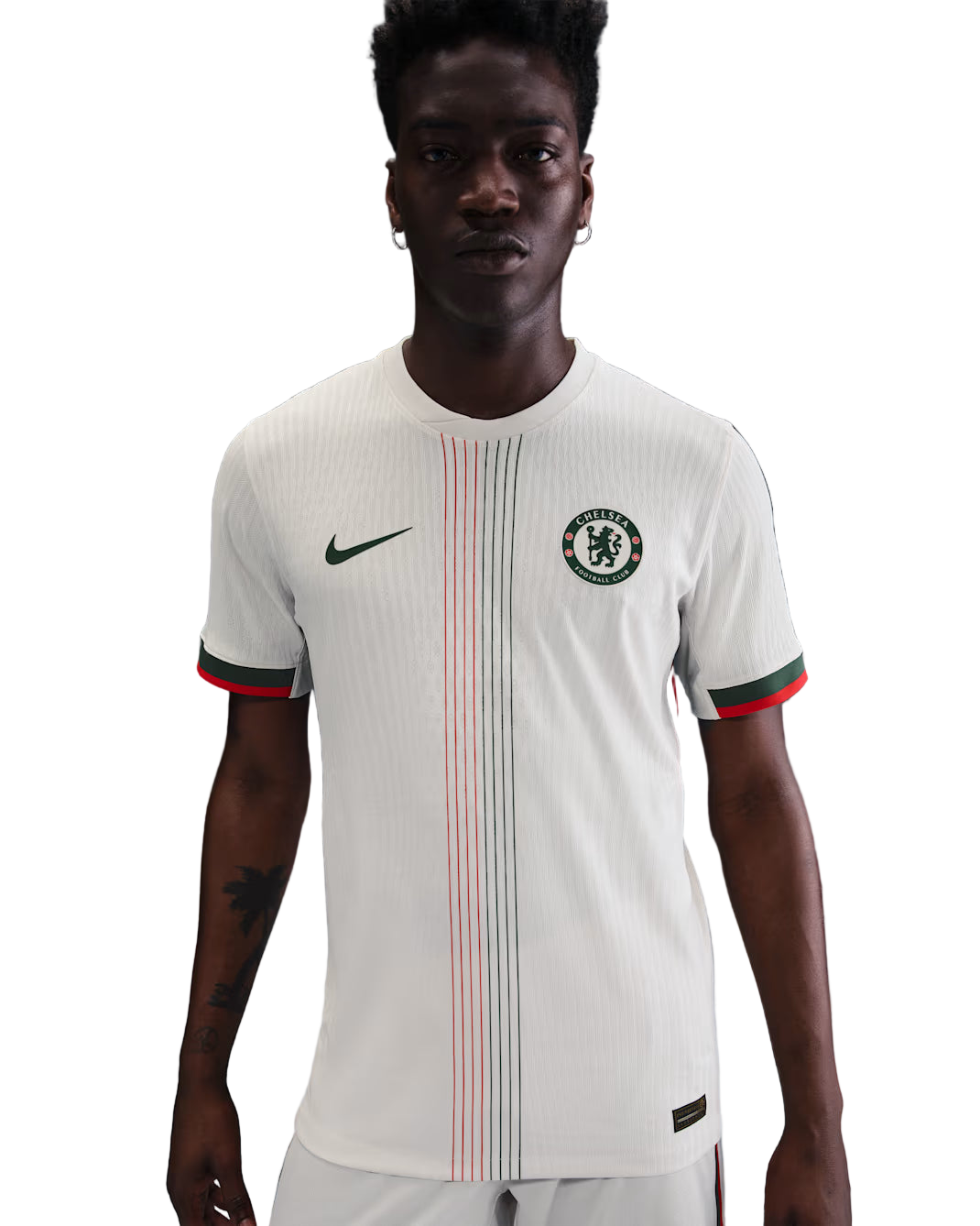 Person wearing a white sports jersey with red and green accents on a gradient background