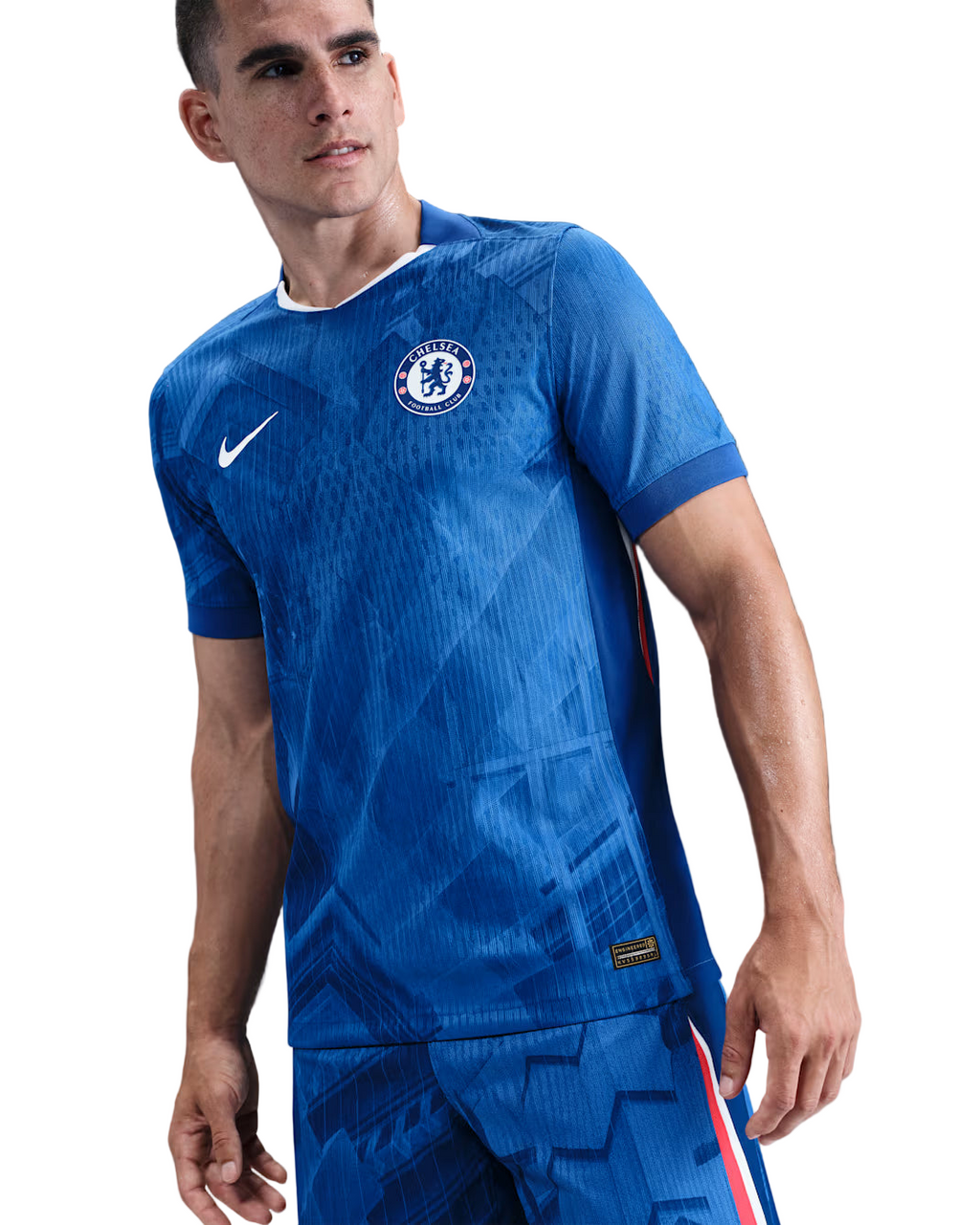 Person wearing a blue sports outfit with a logo on a gradient background