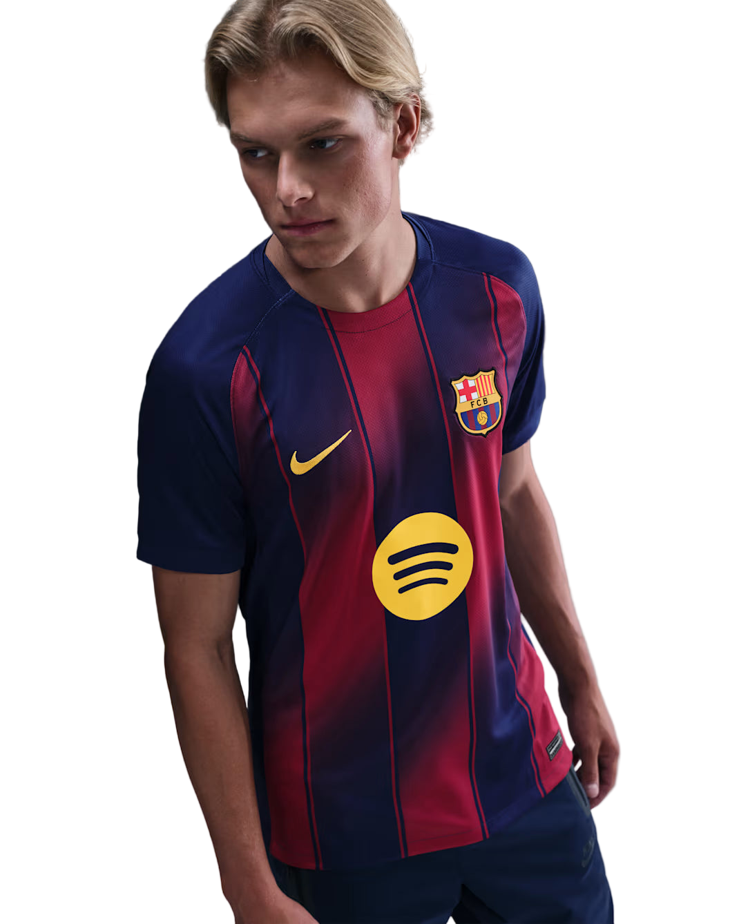 Person wearing a Barcelona soccer jersey with Spotify logo