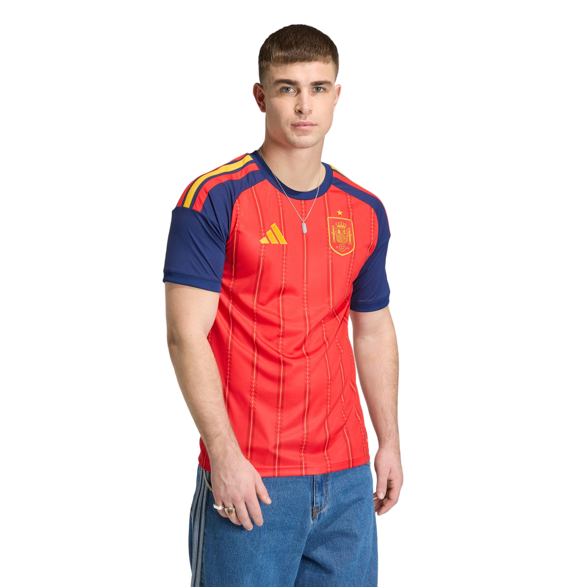 Man wearing a red and blue sports jersey with Adidas logo on a white background